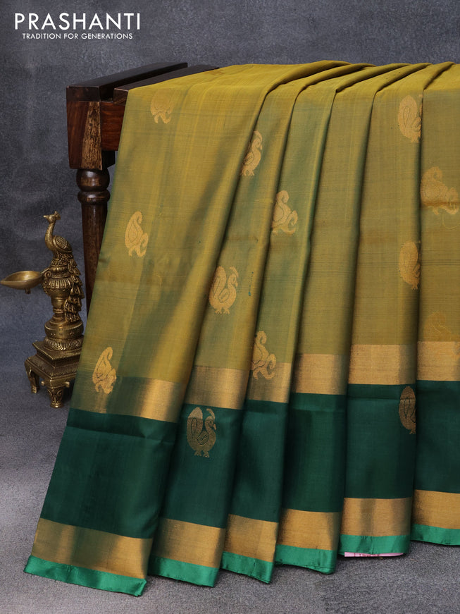 Pure uppada silk saree mehendi green and green with annam & paisley zari woven buttas and long rettapet zari woven annam butta border