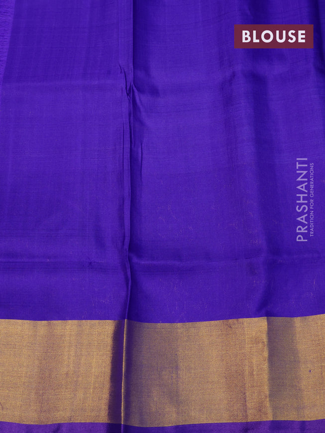 Pure uppada silk saree dual shade of bluish green and blue with allover tilak butta weaves and long rich zari woven border