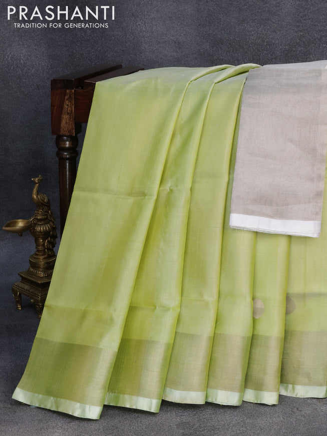 Pure uppada silk saree pista green with silver zari woven coin buttas and silver zari woven border