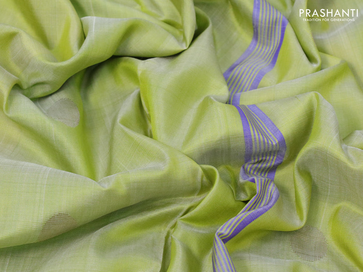 Pure uppada silk saree pista green with silver zari woven coin buttas and silver zari woven border