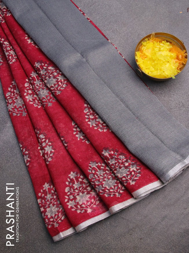Pure linen saree maroon shade with butta prints and silver zari woven piping border