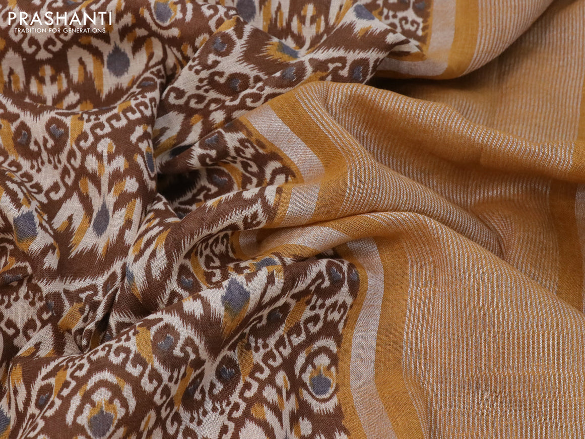 Pure linen saree brown with allover ikat prints and silver zari woven piping border