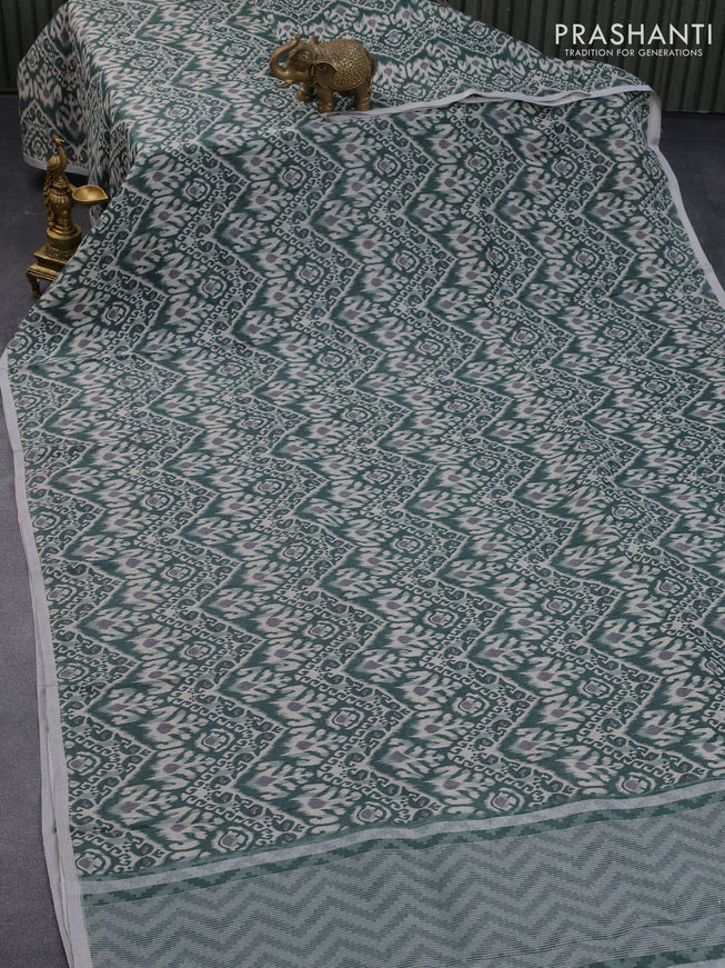 Pure linen saree sap green with allover ikat prints and silver zari woven piping border