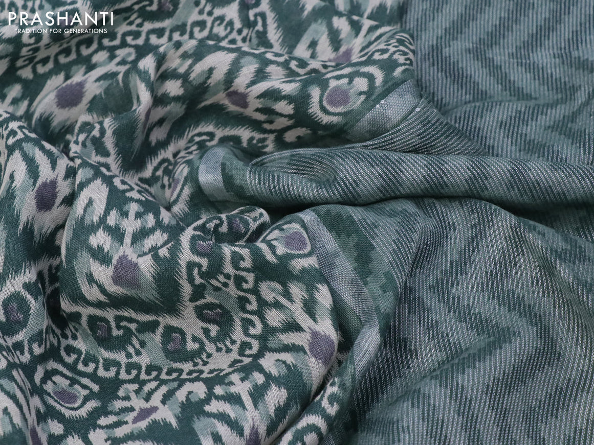 Pure linen saree sap green with allover ikat prints and silver zari woven piping border