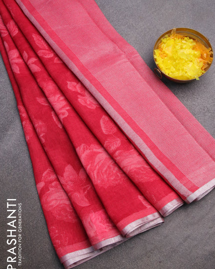 Pure linen saree pink shade with allover floral prints and silver zari woven piping border