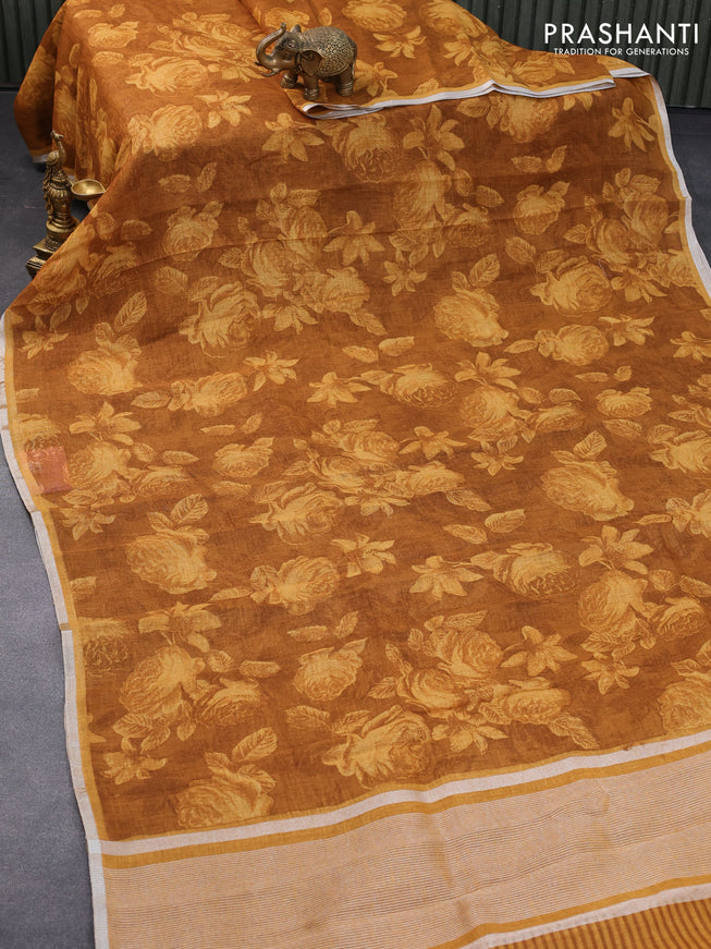 Pure linen saree brown and dark mustard with allover floral prints and silver zari woven piping border