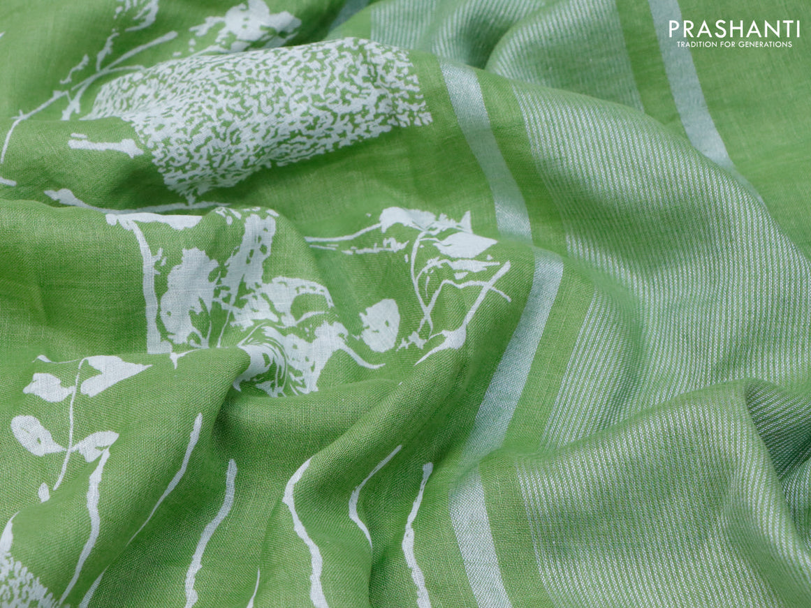 Pure linen saree light green with allover stripes pattern and silver zari woven piping border