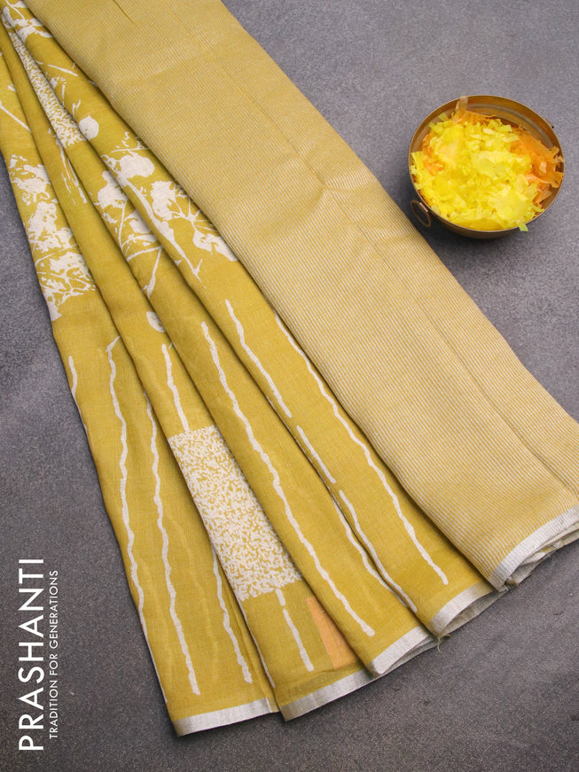 Pure linen saree lime yellow with allover stripes pattern and silver zari woven piping border