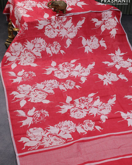 Pure linen saree tomato pink with allover floral prints and silver zari woven piping border