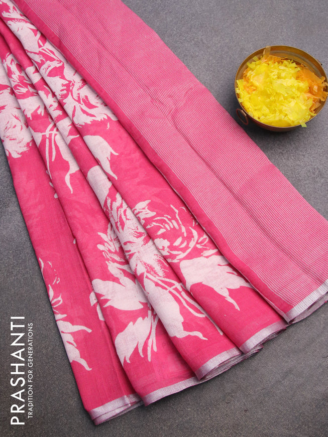 Pure linen saree light pink with allover floral prints and silver zari woven piping border