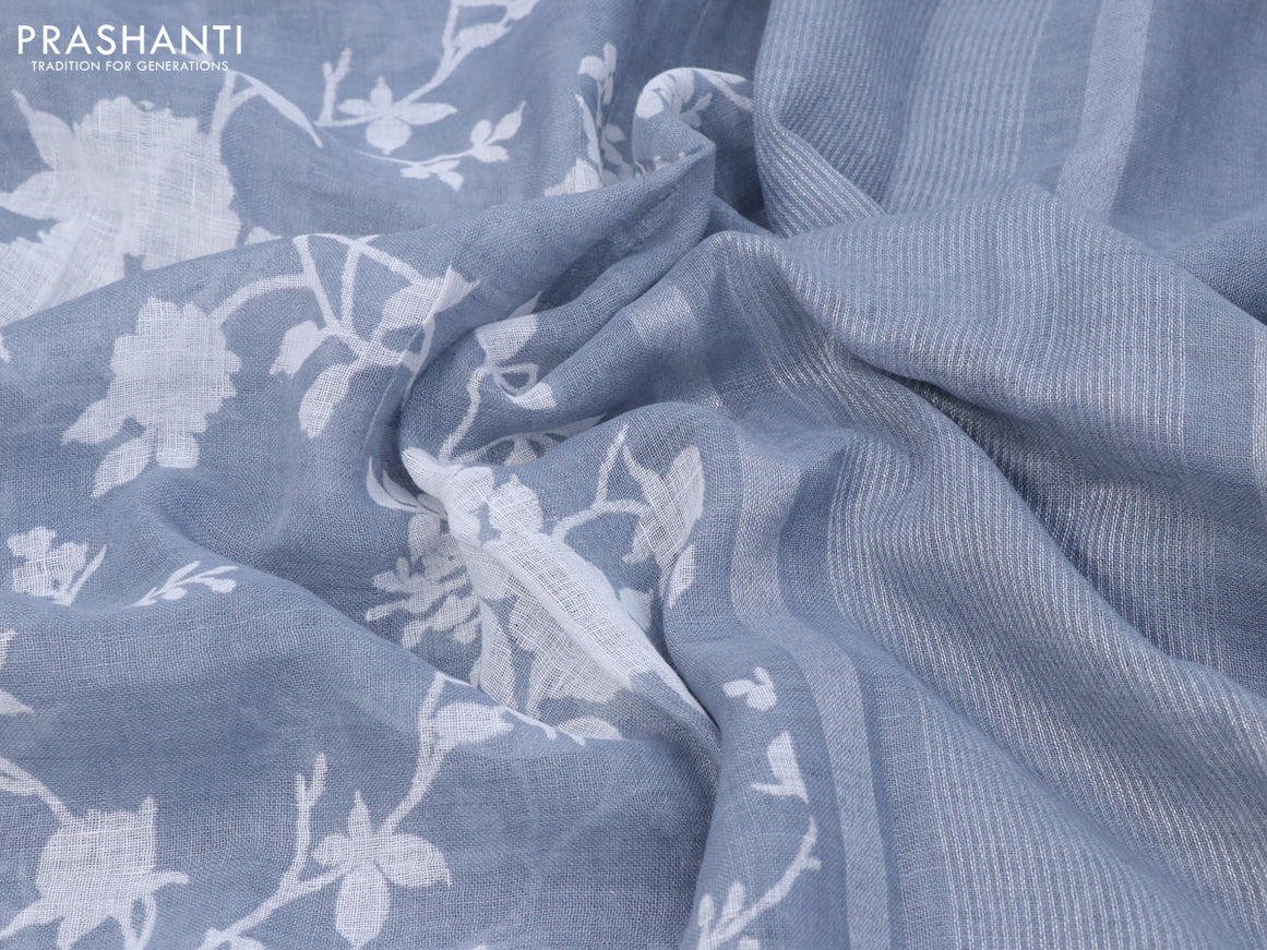 Pure linen saree grey with allover floral prints and silver zari woven piping border
