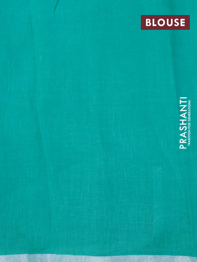 Pure linen saree teal blue with allover zig zag prints and silver zari woven piping border