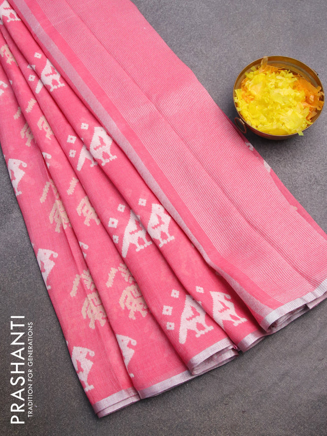 Pure linen saree light pink with patola prints and silver zari woven piping border