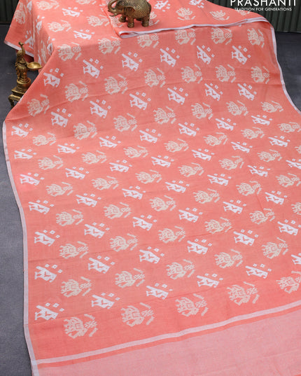 Pure linen saree peach orange with patola prints and silver zari woven piping border