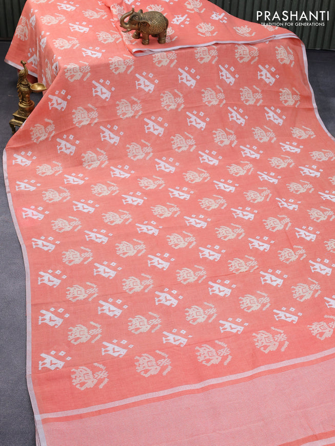 Pure linen saree peach orange with patola prints and silver zari woven piping border