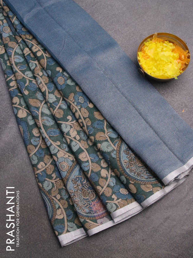 Pure linen saree sap green shade with allover kalamkari prints and silver zari woven piping border