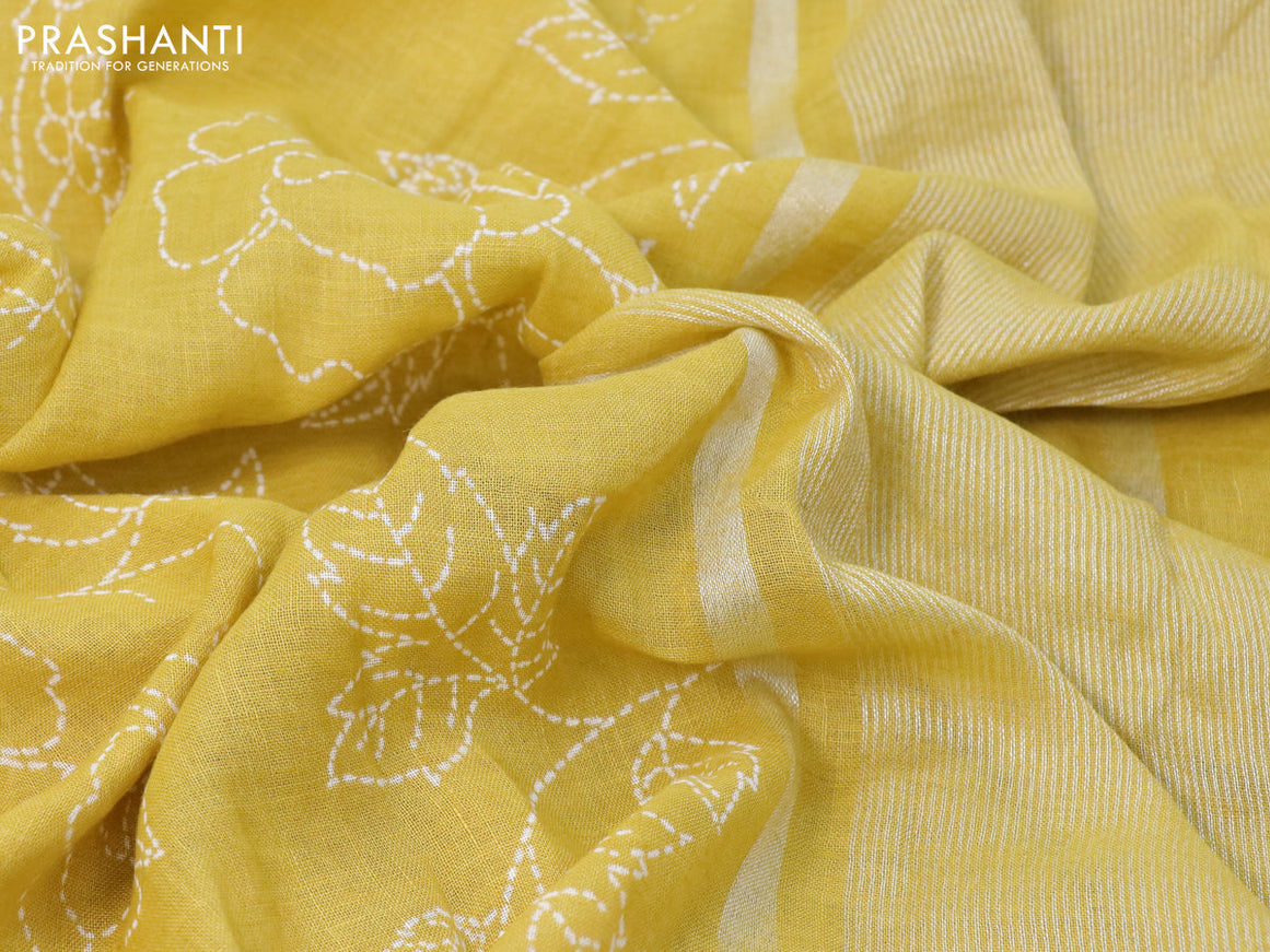 Pure linen saree lime yellow with allover prints and silver zari woven piping border