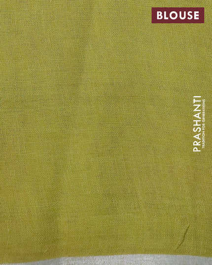 Pure linen saree lime green with allover floral prints and silver zari woven piping border