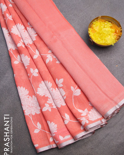 Pure linen saree peach orange with allover floral prints and silver zari woven piping border