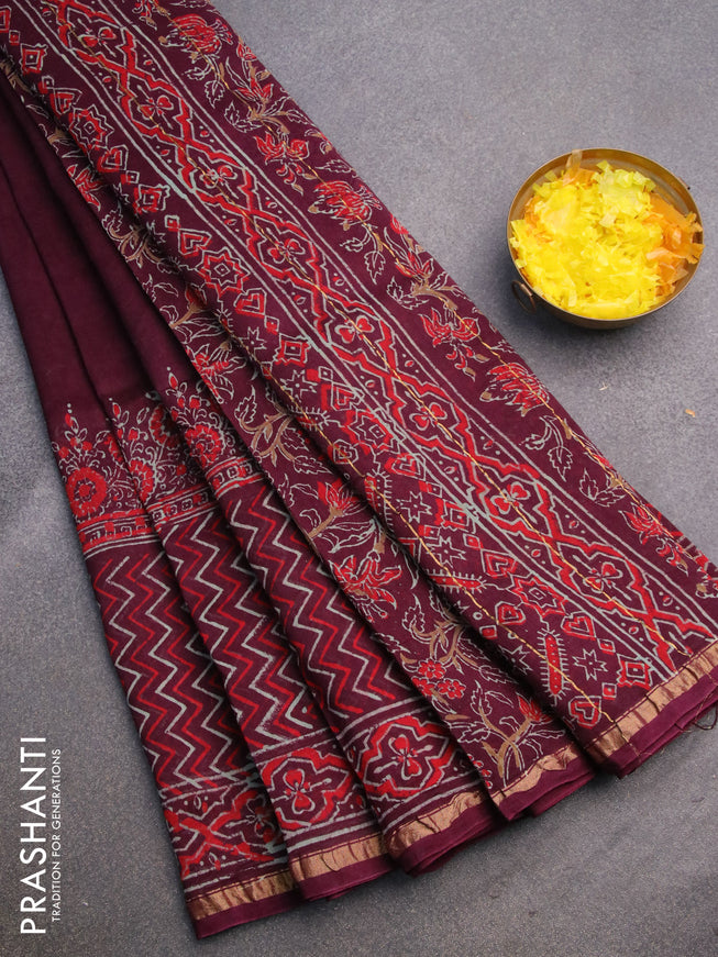 Chanderi bagru saree deep maroon with allover prints and zari woven piping border