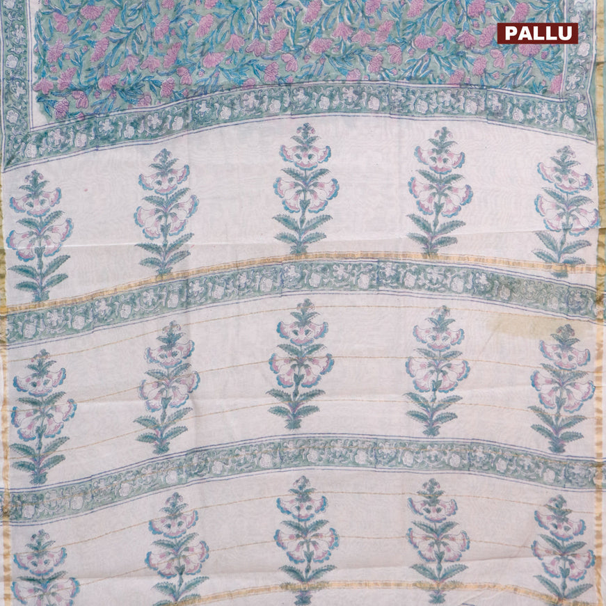 Chanderi bagru saree green shade with allover floral prints and zari woven piping border