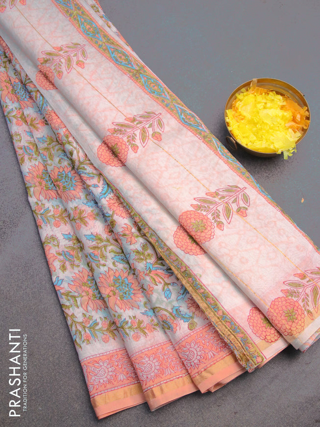 Chanderi bagru saree off white and peach orange with allover floral prints and zari woven piping border