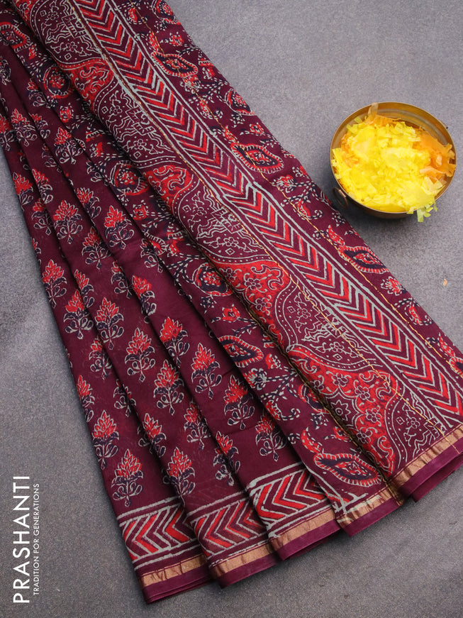 Chanderi bagru saree wine shade with allover floral prints and zari woven piping border