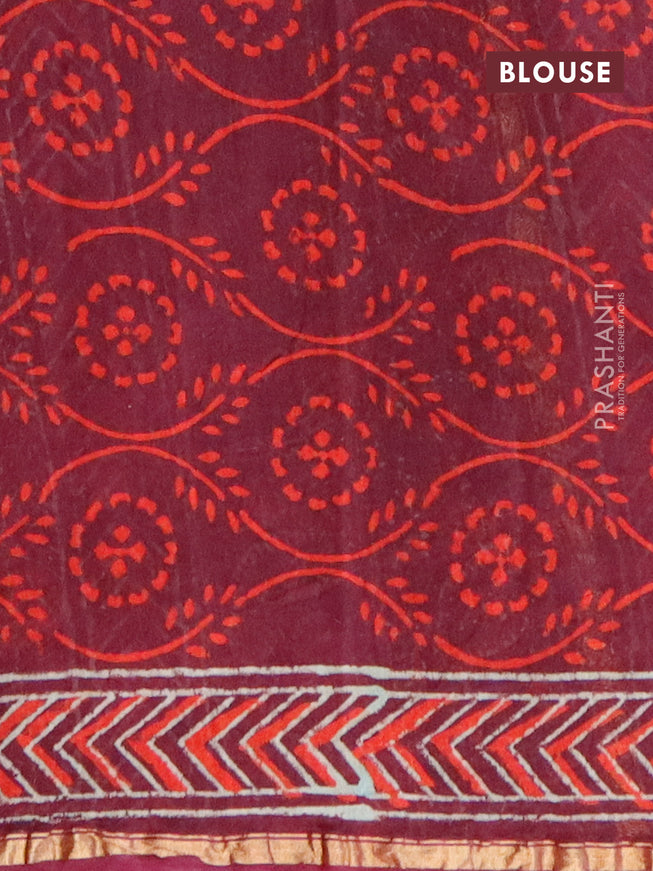 Chanderi bagru saree wine shade with allover floral prints and zari woven piping border