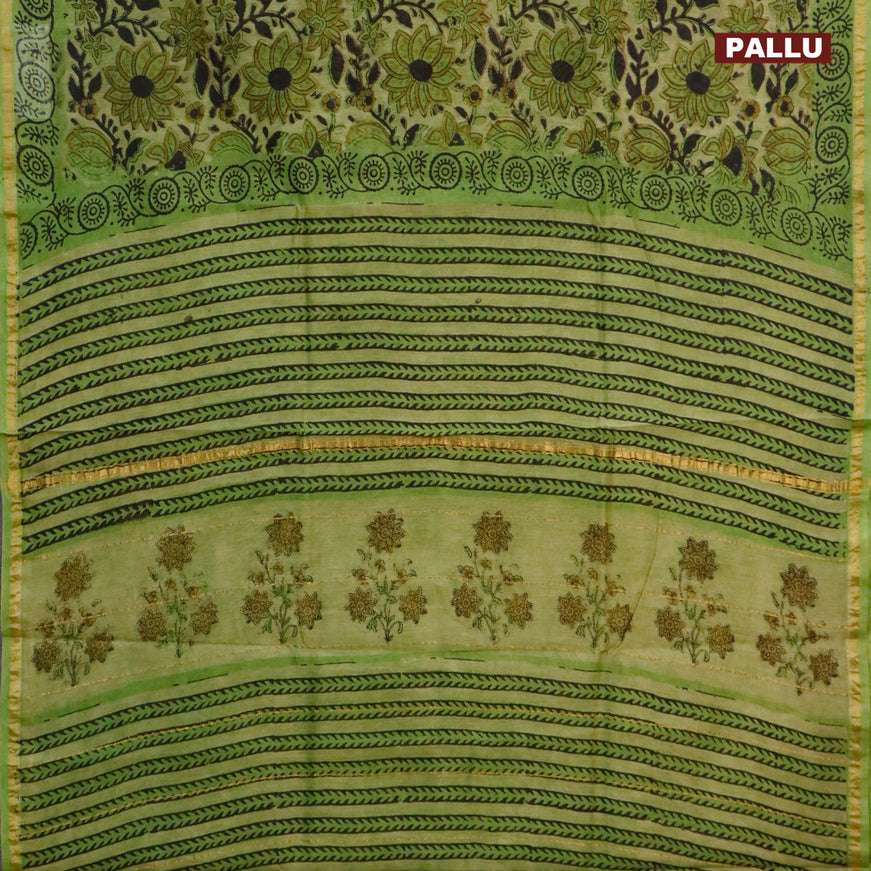 Chanderi bagru saree light green with allover floral prints and zari woven piping border