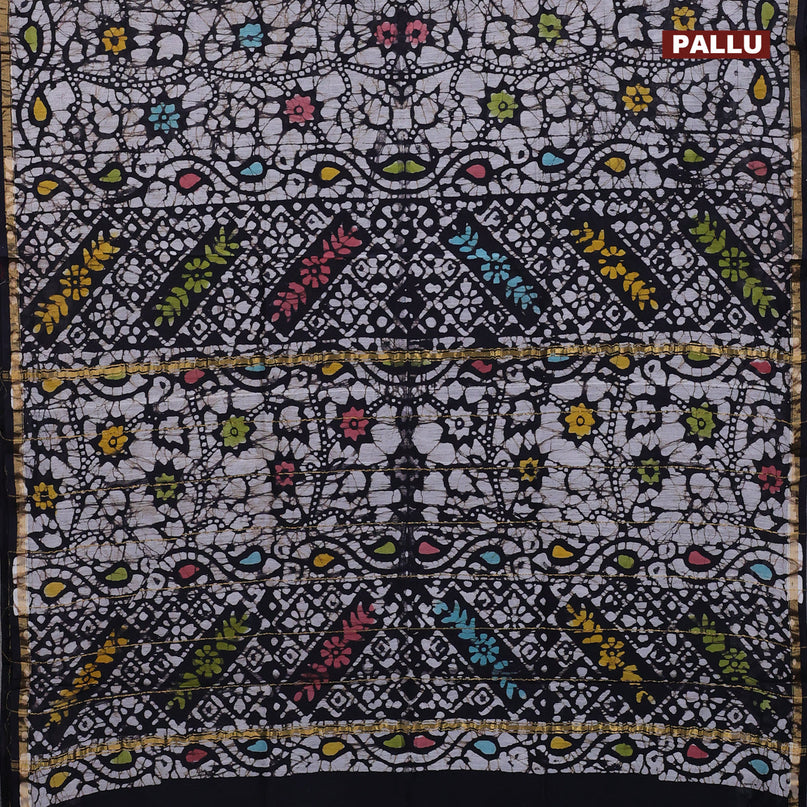 Chanderi bagru saree black and off white with allover batik prints and zari woven piping border