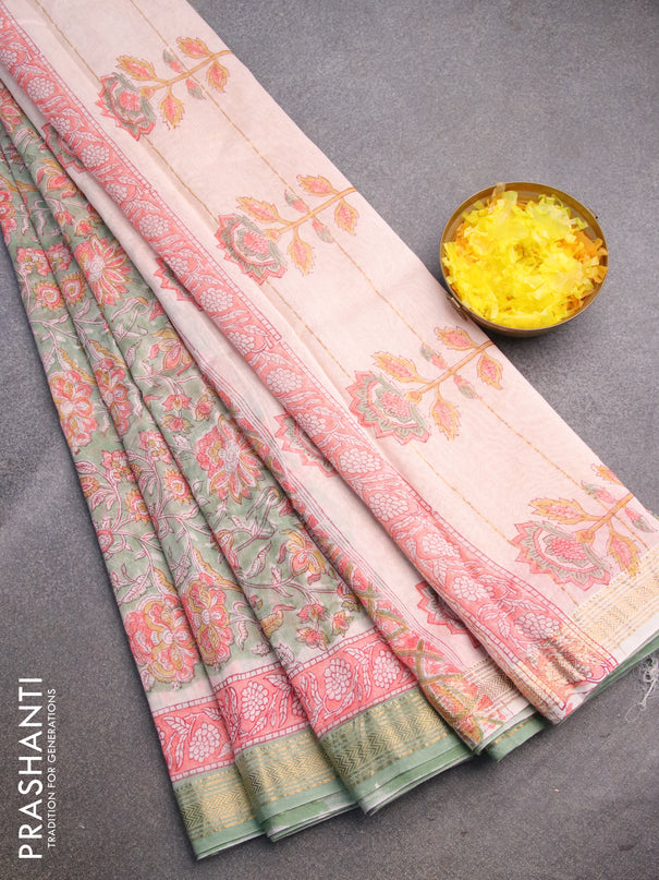 Chanderi bagru saree pastel green with allover floral prints and zari woven maheshwari border