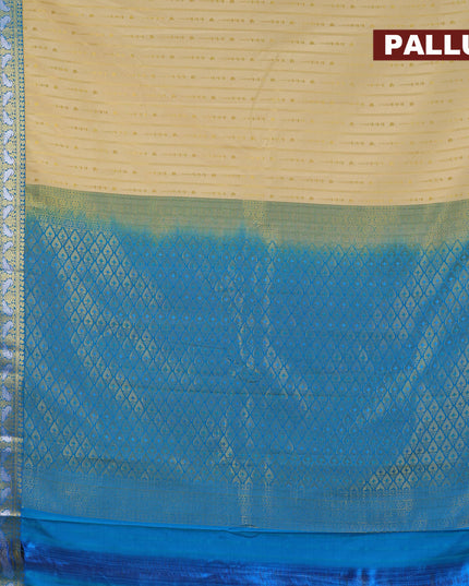 Semi kanjivaram silk saree cream and cs blue with allover zari weaves and zari woven korvai border