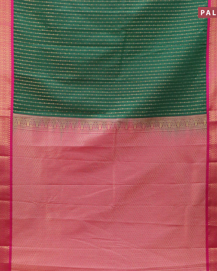 Semi kanjivaram silk saree dark green and pink with allover zari weaves and zari woven korvai border
