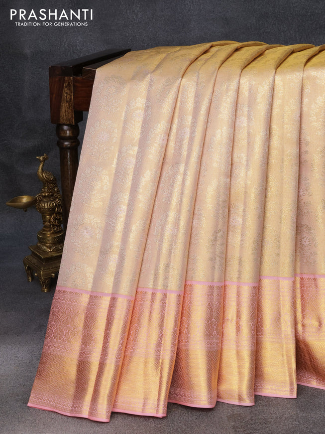 Pure kanjivaram tissue silk saree sandal and peach pink with allover zari woven brocade weaves and zari woven border