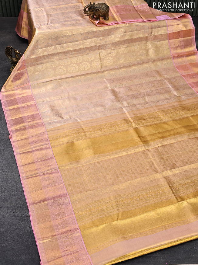 Pure kanjivaram tissue silk saree sandal and peach pink with allover zari woven brocade weaves and zari woven border