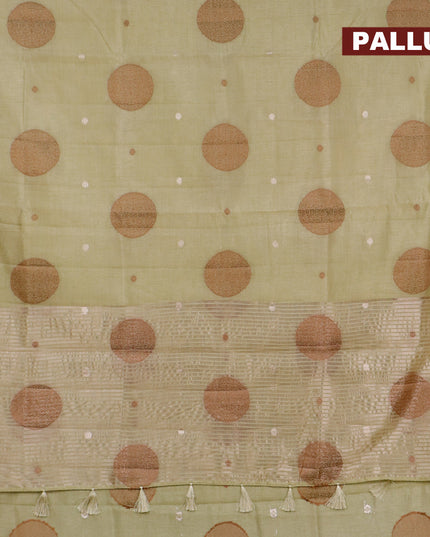 Semi raw silk saree pista green with thread & zari woven buttas and woven border