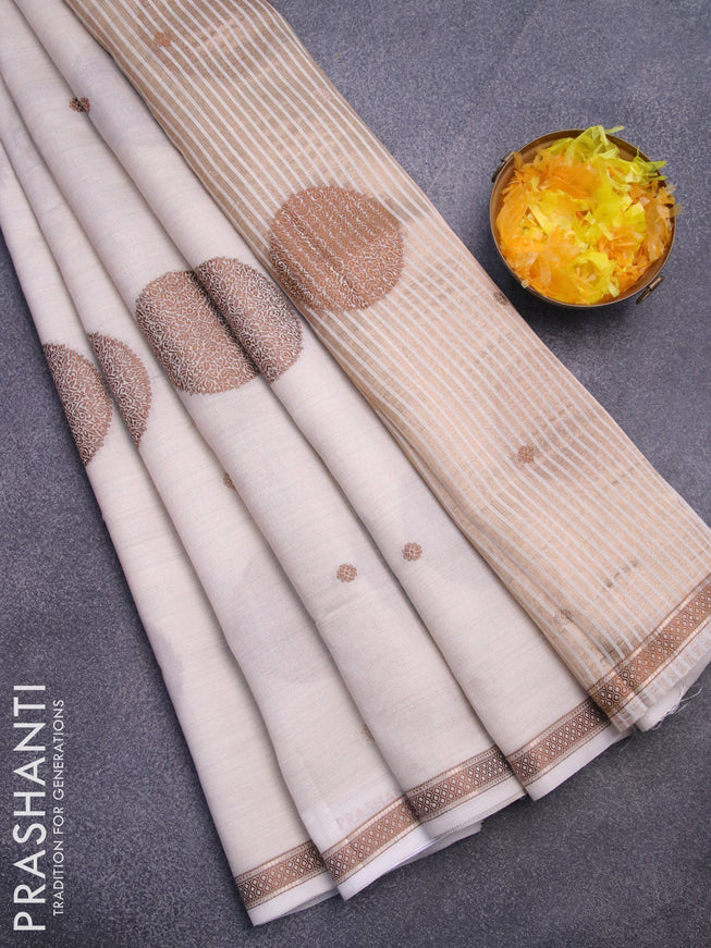 Semi raw silk saree cream with thread & zari woven buttas and woven border
