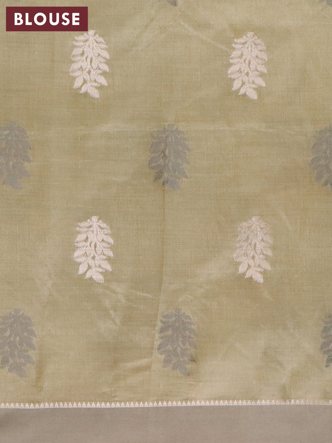 Semi raw silk saree elaichi green with thread & zari woven buttas and simple border