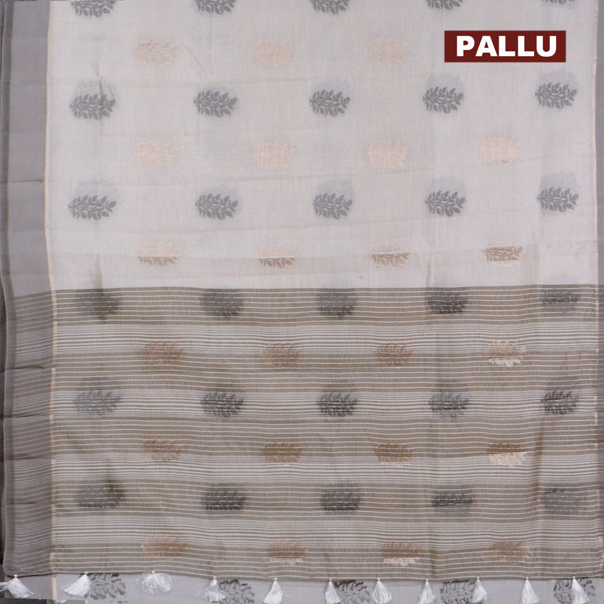 Semi raw silk saree cream with thread & zari woven buttas and simple border