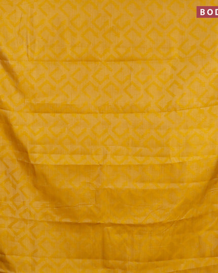 Semi raw silk saree mustard yellow with allover self emboss and copper zari woven simple border