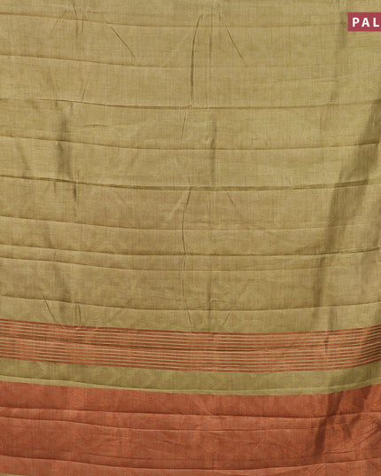 Semi raw silk saree elaichi green with allover self emboss and copper zari woven simple border