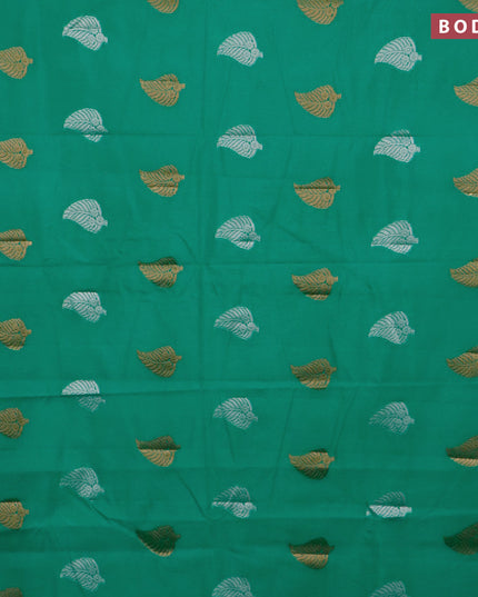 Semi raw silk saree green with silver & gold zari woven leaf buttas and small zari woven border
