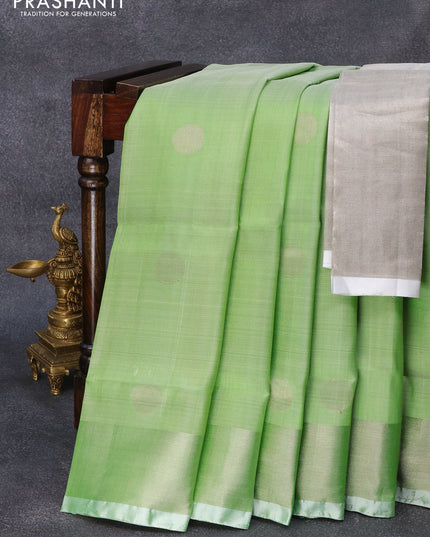 Pure uppada silk saree green shade with silver zari woven coin buttas and silver zari woven border