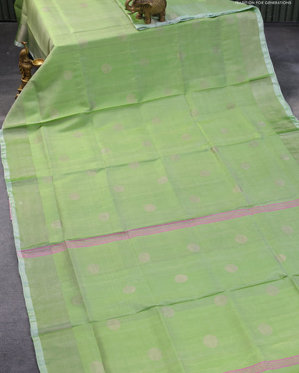 Pure uppada silk saree green shade with silver zari woven coin buttas and silver zari woven border
