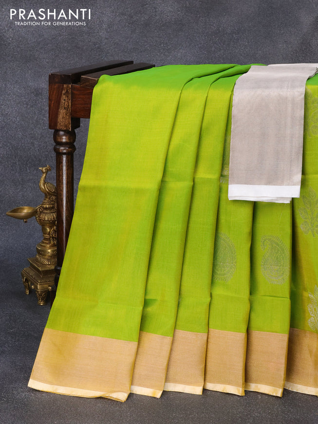 Pure uppada silk saree light hreen and pale yellow shade with leaf & paisley silver zari woven buttas and zari woven border