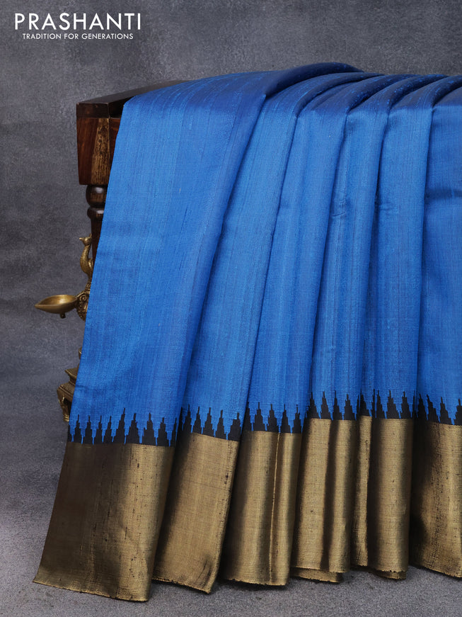 Pure dupion silk saree cs blue and black with plain body and temple design zari woven border