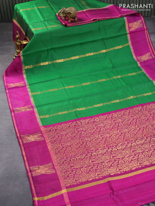 Pure dupion silk saree green and magenta pink with zari weaves and zari woven butta border