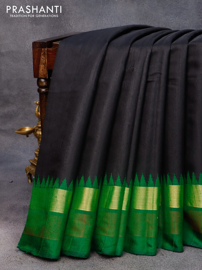 Pure dupion silk saree black and green with plain body and temple design zari woven simple border