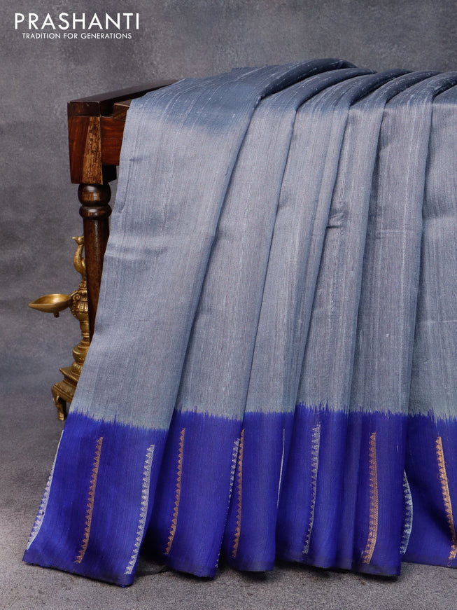 Pure dupion silk saree grey and blue with plain body and zari woven border