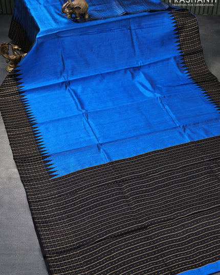 Pure dupion silk saree cs blue and black with plain body and temple design zari checked border